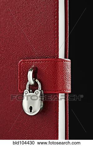 Stock Image - Close up of lock on diary. Fotosearch