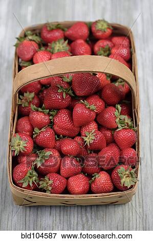 Stock Photo - Fresh, red strawberries in basket. Fotosearch