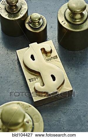 Gold ingot with dollar sign symbol View Large Photo Image Stock Photo - Gold ingot with dollar sign symbol. Fotosearch