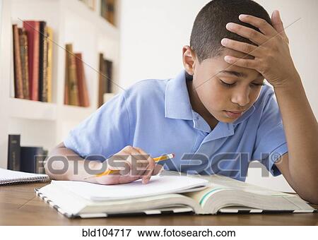 Hispanic boy doing homework View Large Photo Image Stock Photo - Hispanic boy doing homework. Fotosearch