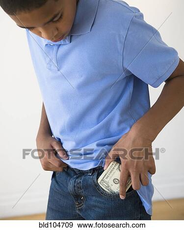 Hispanic boy putting in pocket View Large Photo Image Stock Photo - Hispanic boy putting in pocket. Fotosearch