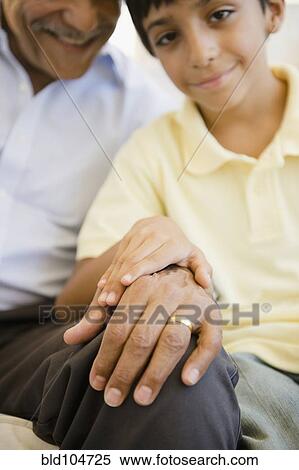 Hispanic grandfather and grandson holding hands View Large Photo Image Stock Photography - Hispanic grandfather and grandson holding hands. Fotosearch