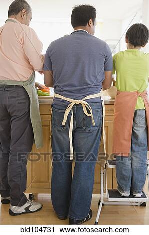 Hispanic grandfather, father and son washing dishes View Large Photo Image Stock Image - Hispanic grandfather, father and son washing dishes. Fotosearch