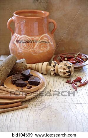 Mexican hot chocolate with cinnamon and chilis View Large Photo Image Stock Photo - Mexican hot chocolate with cinnamon and chilis. Fotosearch