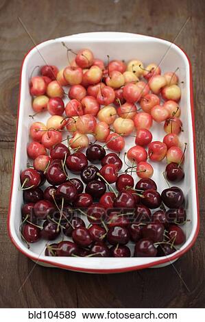 Rainier and bing cherries in pan View Large Photo Image Stock Photo - Rainier and bing cherries in pan. Fotosearch