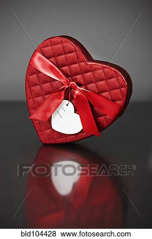 Stock Photo - Red Valentine's heart-shaped box. Fotosearch