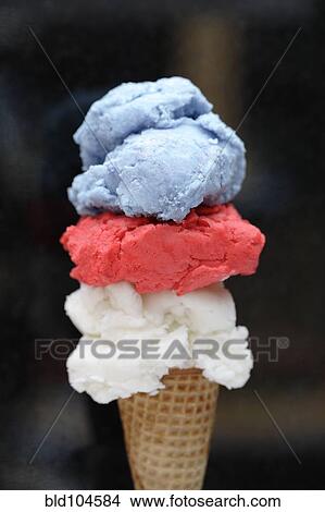 Picture - Red, white and blue ice cream in cone. Fotosearch