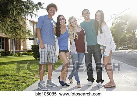 Stock Photography - School friends standing together. Fotosearch