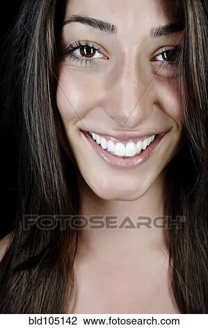 Stock Image - Smiling Caucasian woman. Fotosearch