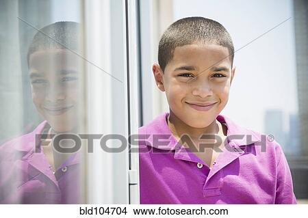 Picture - Smiling Hispanic boy. Fotosearch