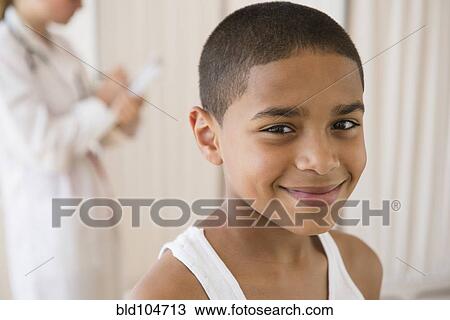Stock Image - Smiling Hispanic boy. Fotosearch