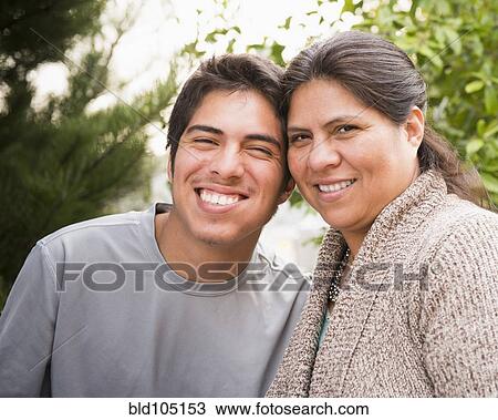 Stock Image - Smiling Hispanic mother and son. Fotosearch