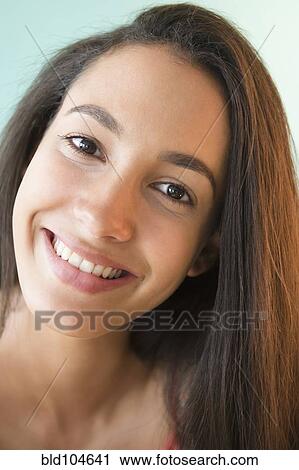 Stock Image - Smiling Hispanic teenager. Fotosearch