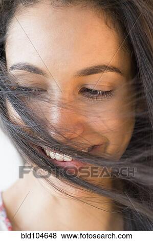Stock Photo - Smiling Hispanic teenager. Fotosearch
