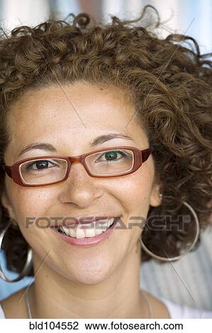 Stock Image - Smiling Hispanic woman. Fotosearch