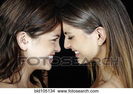 Smiling mixed race friends View Large Photo Image Picture - Smiling mixed race friends. Fotosearch