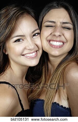 Smiling mixed race friends View Large Photo Image Stock Image - Smiling mixed race friends. Fotosearch