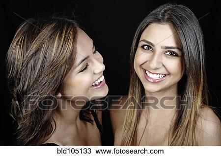 Smiling mixed race friends View Large Photo Image Stock Image - Smiling mixed race friends. Fotosearch
