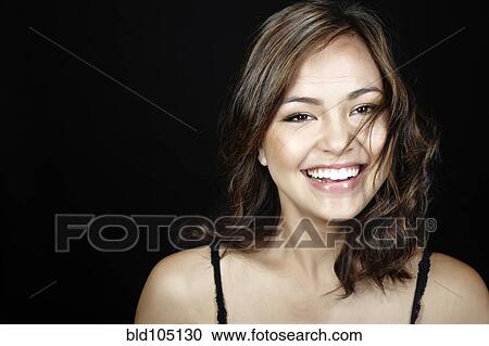 Smiling mixed race woman View Large Photo Image Stock Image - Smiling mixed race woman. Fotosearch