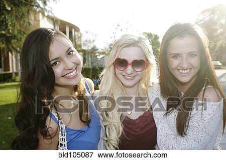 Stock Photo - Smiling school friends. Fotosearch