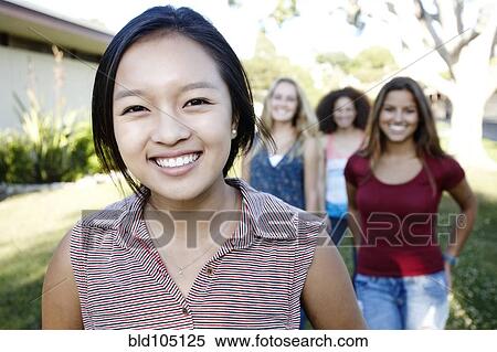 Stock Photography - Smiling school friends. Fotosearch