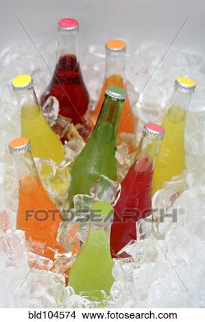 Soda bottles in ice View Large Photo Image Picture - Soda bottles in ice. Fotosearch