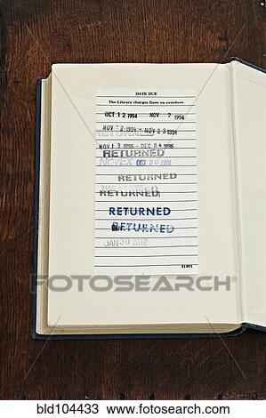 Stamps on library book View Large Photo Image Stock Image - Stamps on library book. Fotosearch