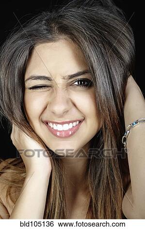 Stock Photograph - Uncertain mixed race teenager. Fotosearch
