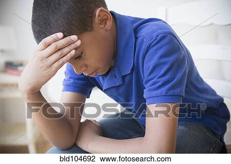 Unhappy Hispanic boy View Large Photo Image Stock Image - Unhappy Hispanic boy. Fotosearch