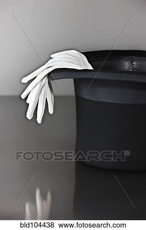 White gloves and top hat View Large Photo Image Stock Photo - White gloves and top hat. Fotosearch