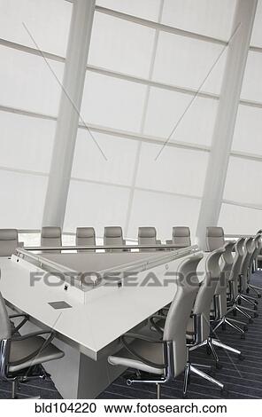 Stock Image - White, modern office conference room. Fotosearch