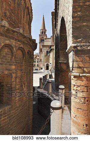 Stock Image - Brick buildings in Italian alley. Fotosearch