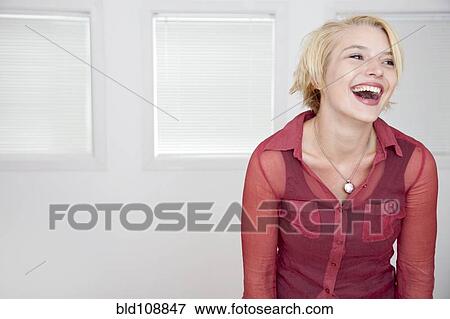 Caucasian woman laughing View Large Photo Image Stock Photo - Caucasian woman laughing. Fotosearch