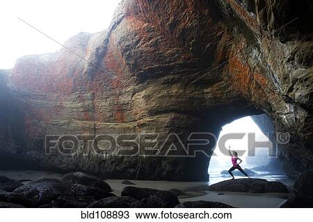 Caucasian woman practicing yoga on rock formations View Large Photo Image Stock Image - Caucasian woman practicing yoga on rock formations. Fotosearch