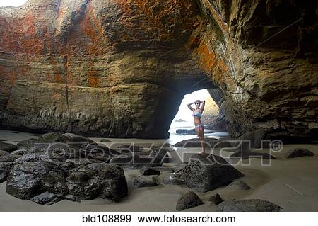 Caucasian woman standing on rock formations View Large Photo Image Stock Photo - Caucasian woman standing on rock formations. Fotosearch