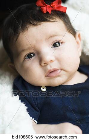 Stock Photography - Hispanic baby's face. Fotosearch