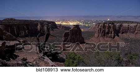 Rock formations in desert valley View Large Photo Image Stock Image - Rock formations in desert valley. Fotosearch