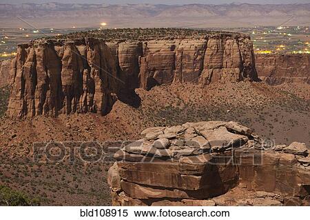 Rock formations in desert valley View Large Photo Image Stock Photography - Rock formations in desert valley. Fotosearch