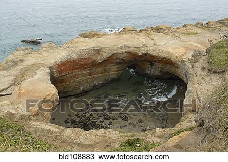 Rock formations on coastline View Large Photo Image Stock Image - Rock formations on coastline. Fotosearch