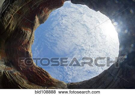 Sky viewed through rock formation View Large Photo Image Stock Photo - Sky viewed through rock formation. Fotosearch