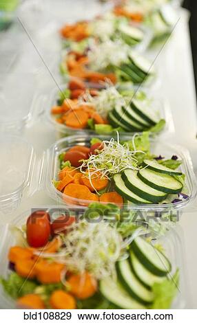 Sliced vegetables in plastic containers View Large Photo Image Stock Photo - Sliced vegetables in plastic containers. Fotosearch