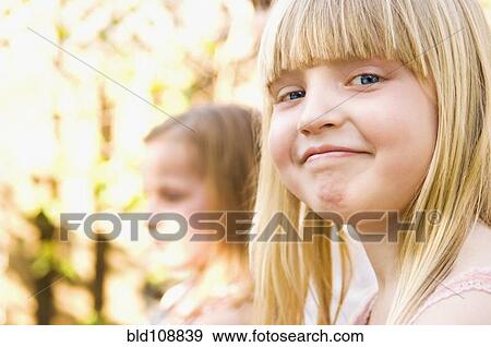 Stock Photo - Smiling Caucasian girl. Fotosearch