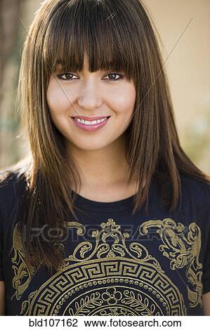 Stock Image - Smiling mixed race woman. Fotosearch