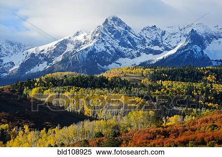 Snowy mountain and trees in rural landscape View Large Photo Image Stock Photography - Snowy mountain and trees in rural landscape. Fotosearch