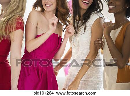 Picture - Women dancing together at party. Fotosearch