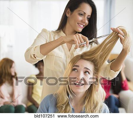 Worried woman having her hair cut View Large Photo Image Stock Image - Worried woman having her hair cut. Fotosearch