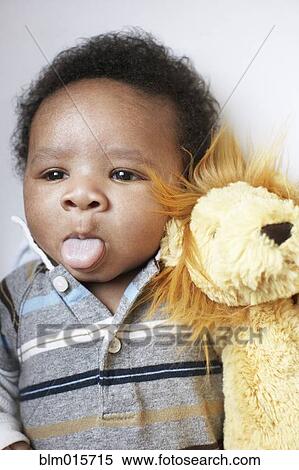 African American baby sticking out tongue View Large Photo Image Stock Photography - African American baby sticking out tongue. Fotosearch