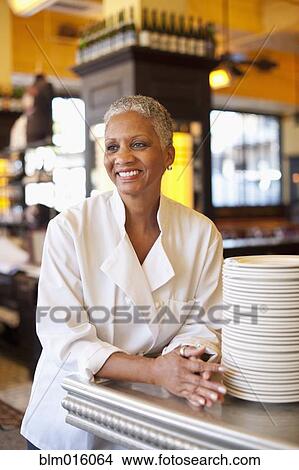 Picture - African American chef in cafe. Fotosearch
