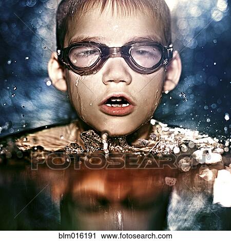 Caucasian boy in goggles swimming View Large Photo Image Stock Image - Caucasian boy in goggles swimming. Fotosearch