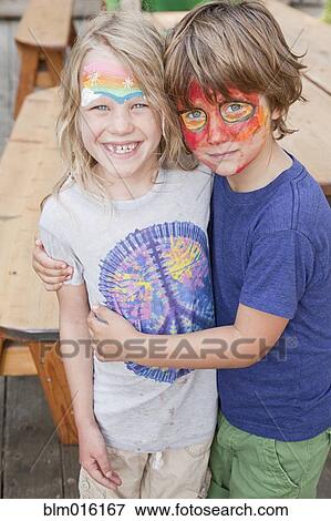 Caucasian brother and sister in face paint View Large Photo Image Stock Photo - Caucasian brother and sister in face paint. Fotosearch